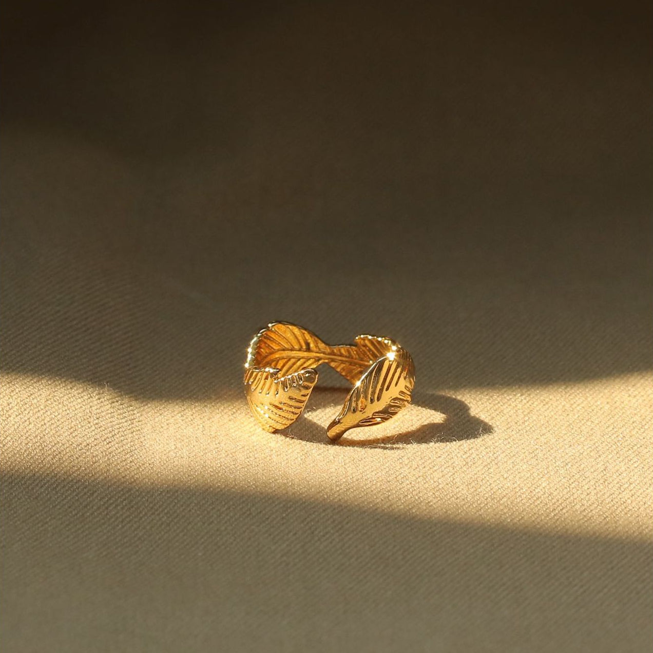ALODIA LEAVES RING IN BRASS WITH 18K GOLD FINISH