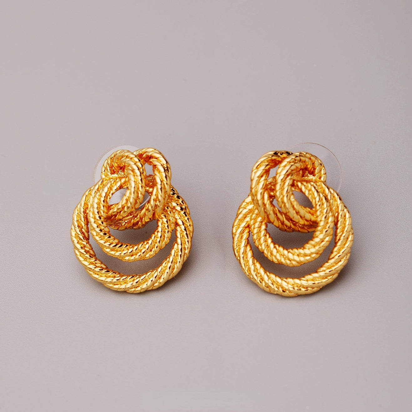 ALODIA WOVEN EARRING IN BRASS WITH 18K GOLD FINISH