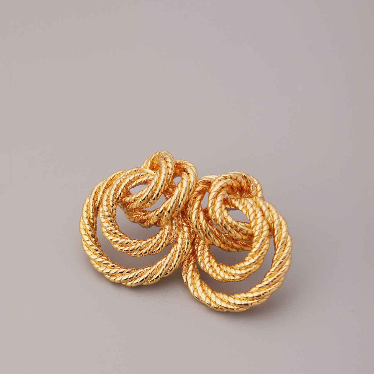 ALODIA WOVEN EARRING IN BRASS WITH 18K GOLD FINISH