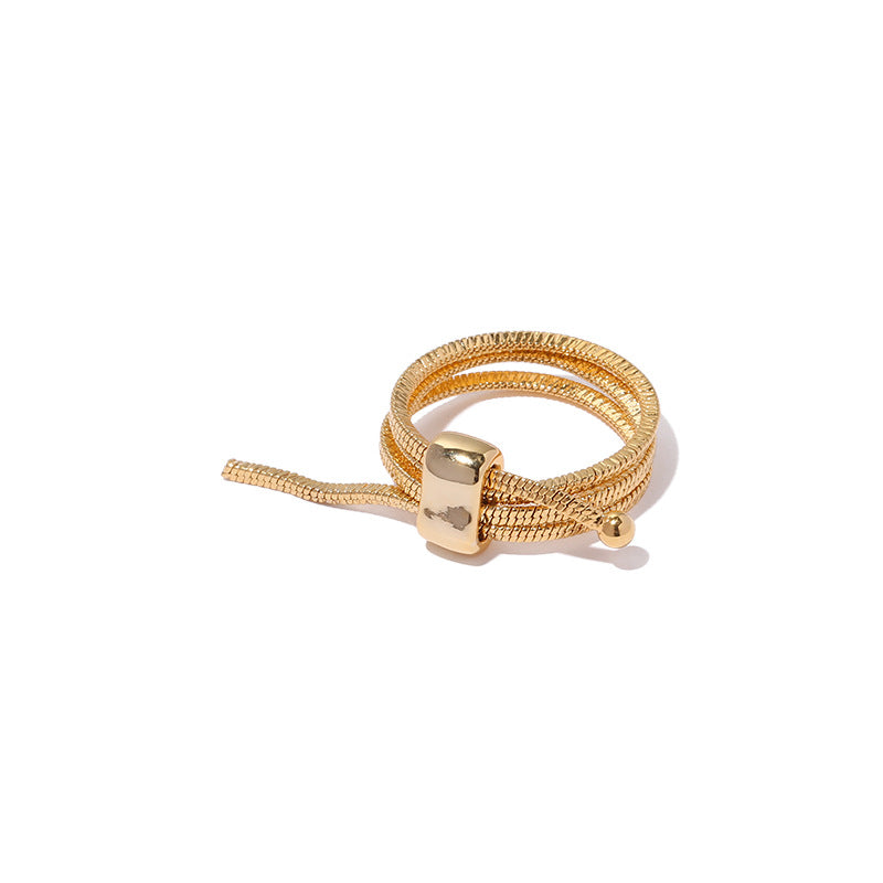 ALODIA ENTANGLE RING IN BRASS WITH 18K GOLD FINISH ADJUSTABLE