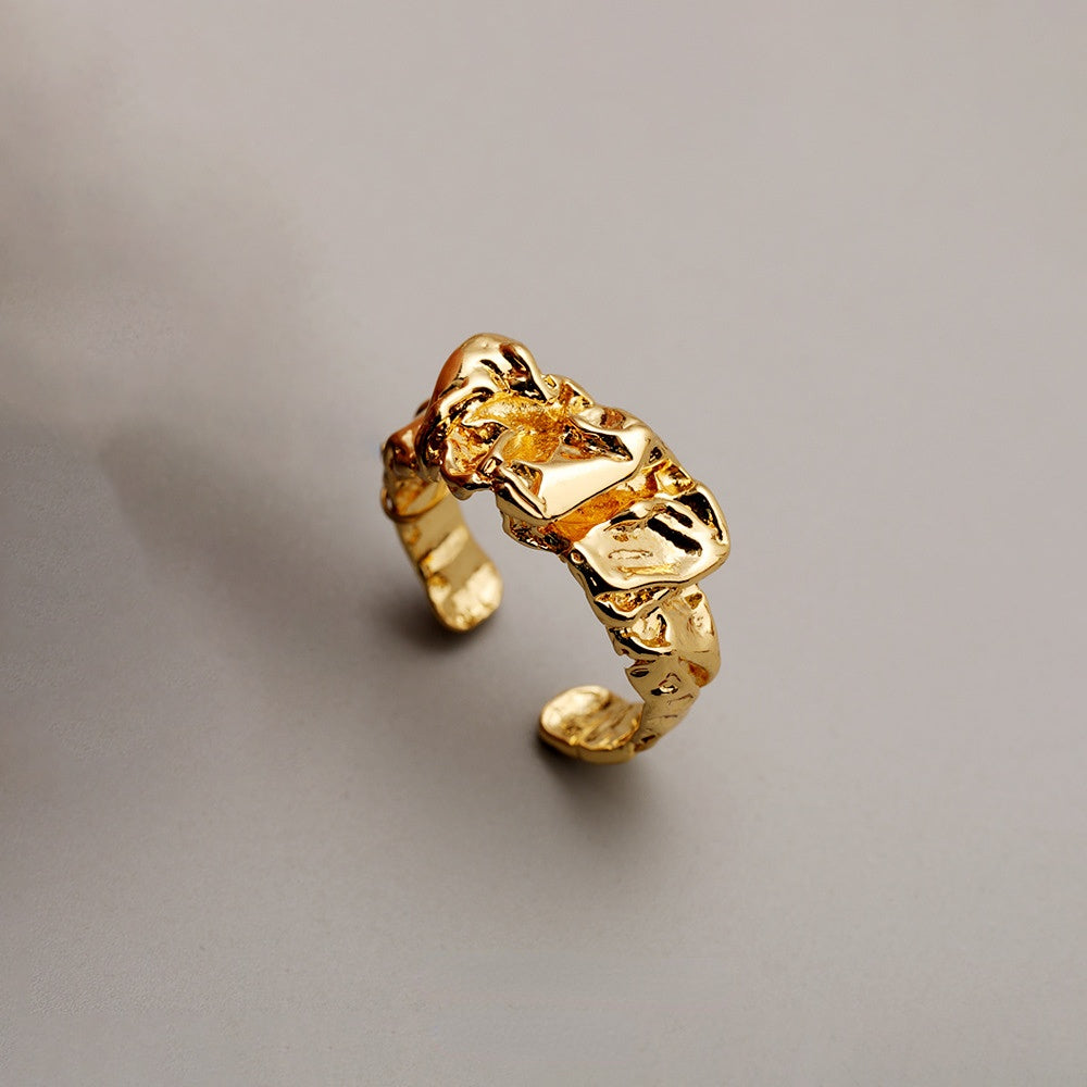 ALODIA FLOWING RING IN BRASS WITH 18K GOLD FINISH ADJUSTABLE