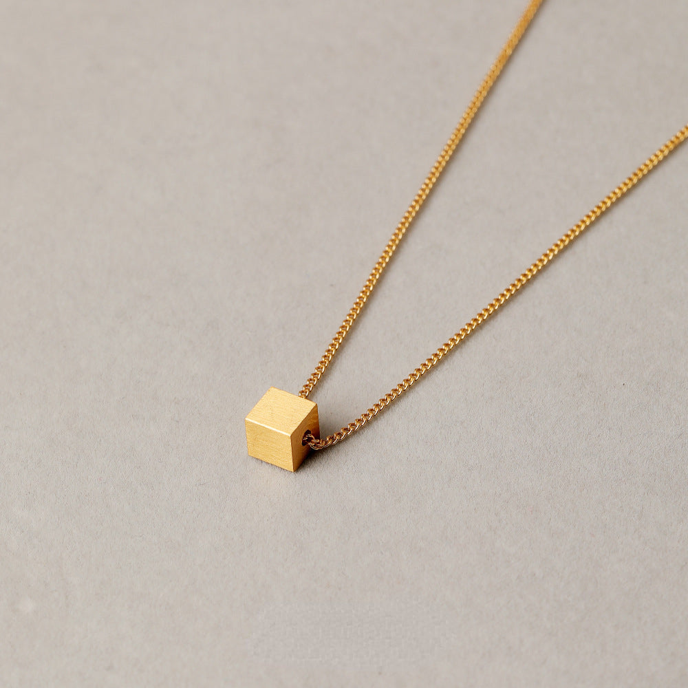 ALODIA  THE CUBE NECKLACE IN BRASS WITH 18K GOLD FINISH MATTE GOLD