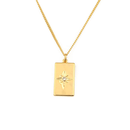 ALODIA  EIGHT AWN STAR NECKLACE IN BRASS WITH 18K GOLD FINISH AND ZIRCON