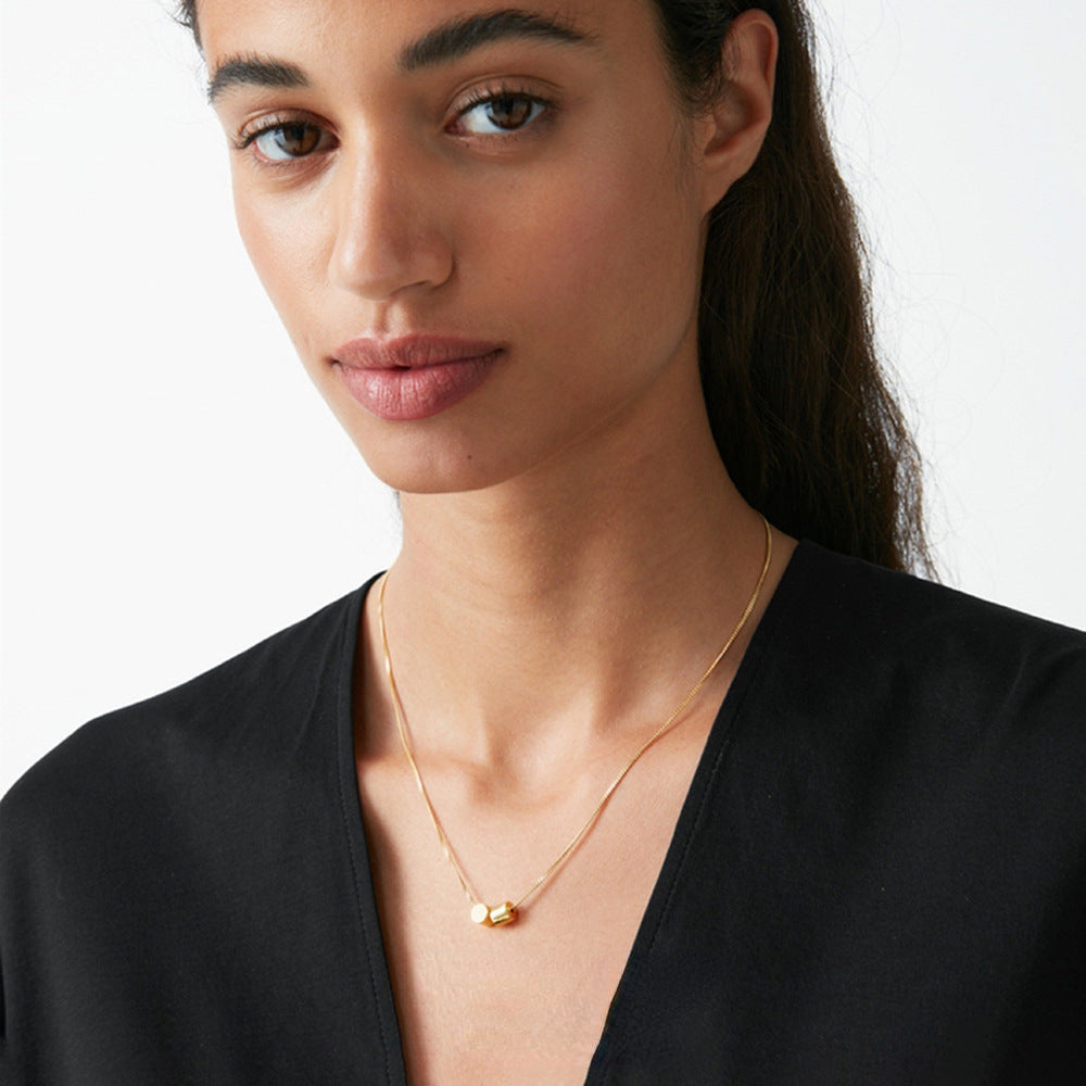 ALODIA  THE CUTE CYLINDER CHIC NECKLACE IN BRASS WITH 18K GOLD FINISH