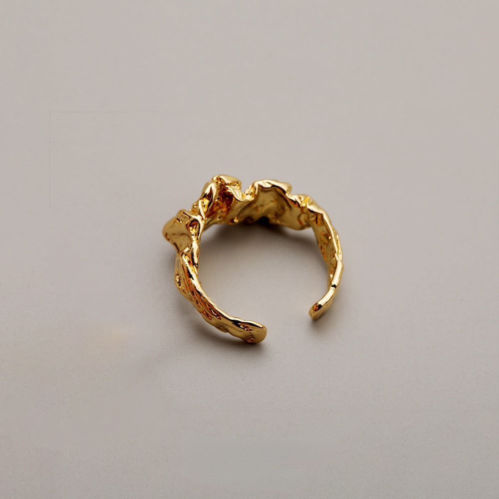 ALODIA  FLOWING RING IN BRASS WITH 18K GOLD FINISH ADJUSTABLE