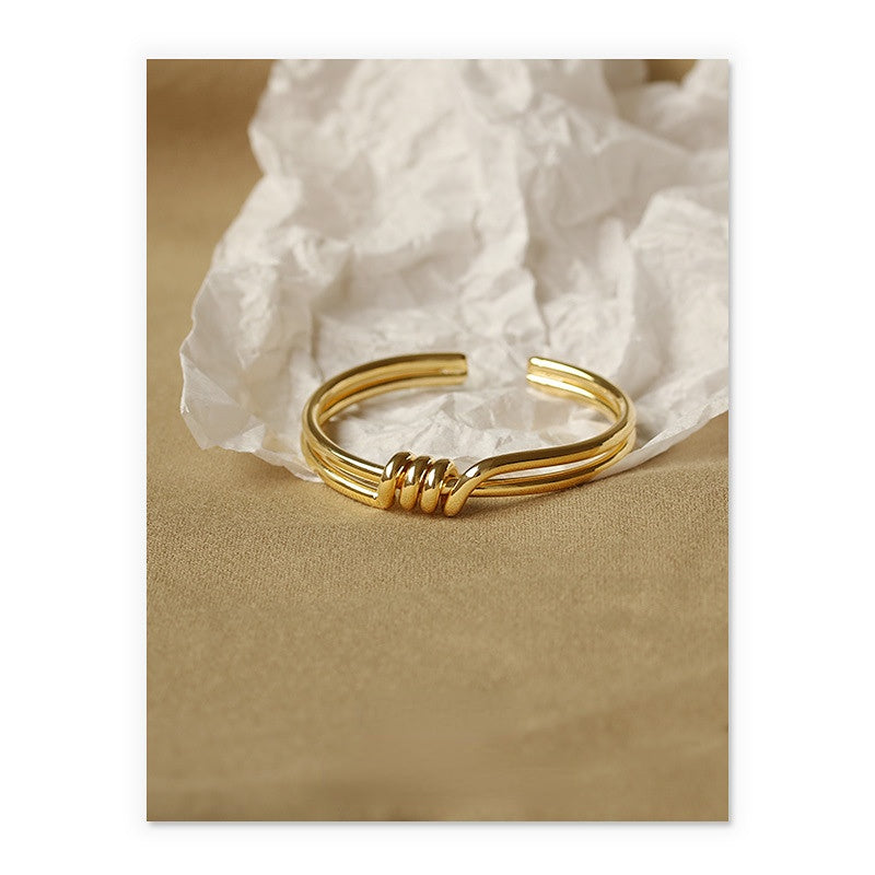 ALODIA  WOVEN BRACELET IN BRASS WITH 18K GOLD FINISH 