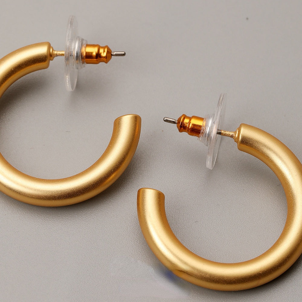 ALODIA  EARRING C-SHAPED IN BRASS WITH 18K GOLD FINISH 