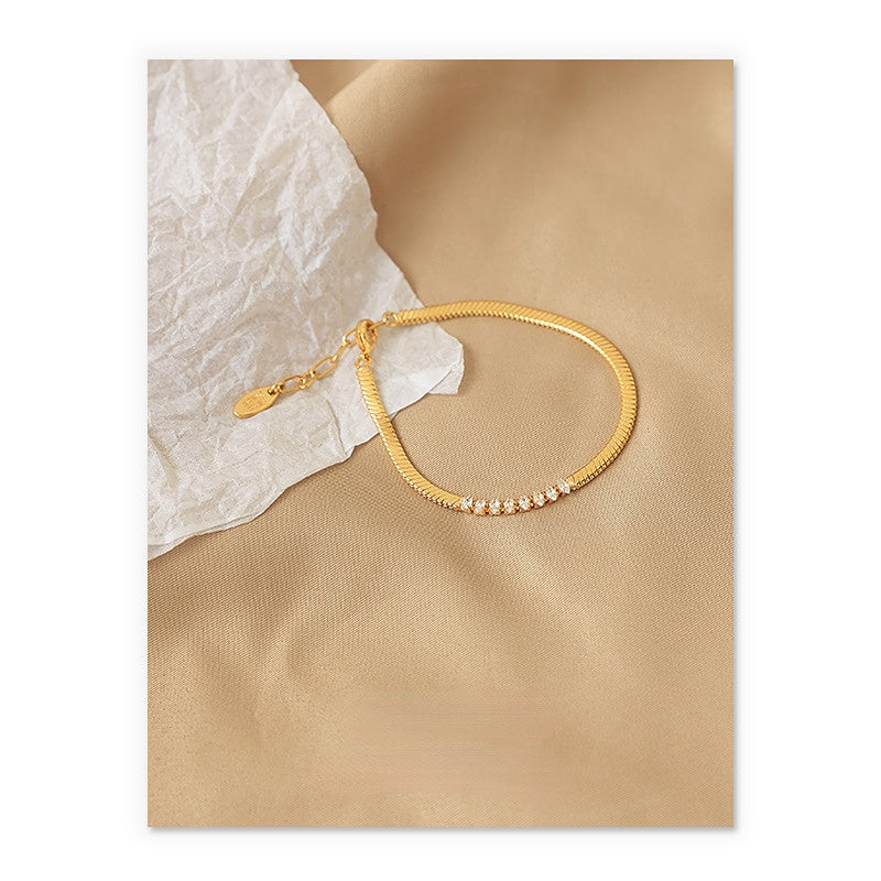 ALODIA  BRACELET IN BRASS WITH 18K GOLD FINISH AND ZIRCON