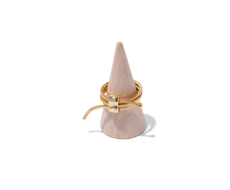 ALODIA  ENTANGLE RING IN BRASS WITH 18K GOLD FINISH  ADJUSTABLE